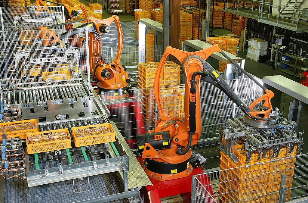 Industrial robots stacking pallets at a bakery in Germany