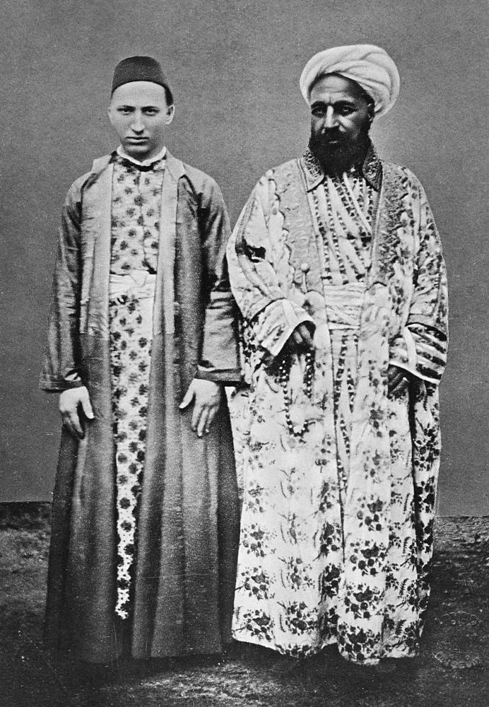 A Meccan merchant (right) with his Circassian slave, 1880s