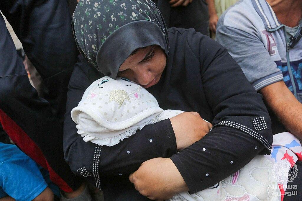 A Palestinian mother cries for her 4-year-old daughter, who died due to malnutrition during Israel's war on Gaza