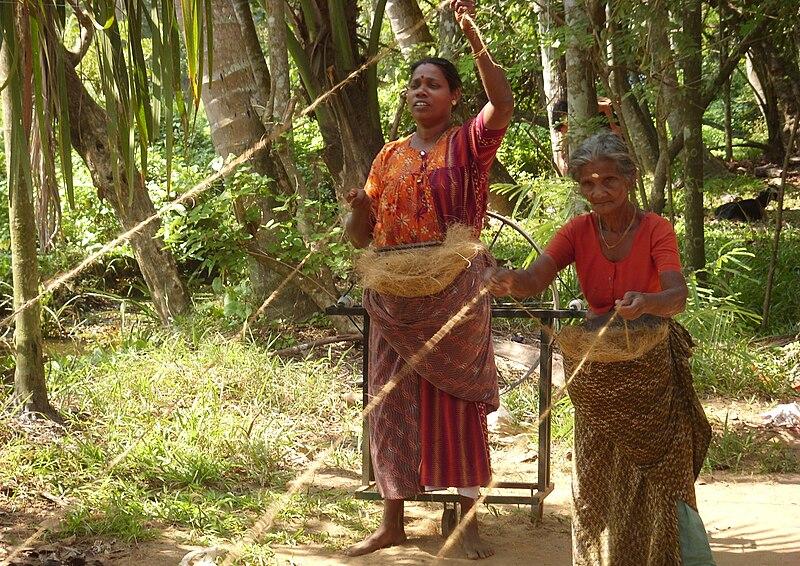 People making coir rope in the Kerala Backwaters near Kochi