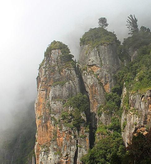 Mist shrouding the Pillar Rocks in Kodaikanal