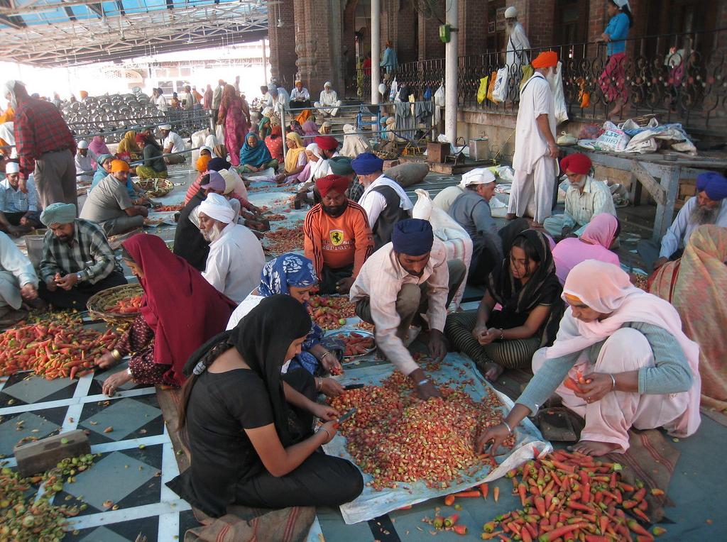 Visitors having a meal at the Golden Temple in Amritsar