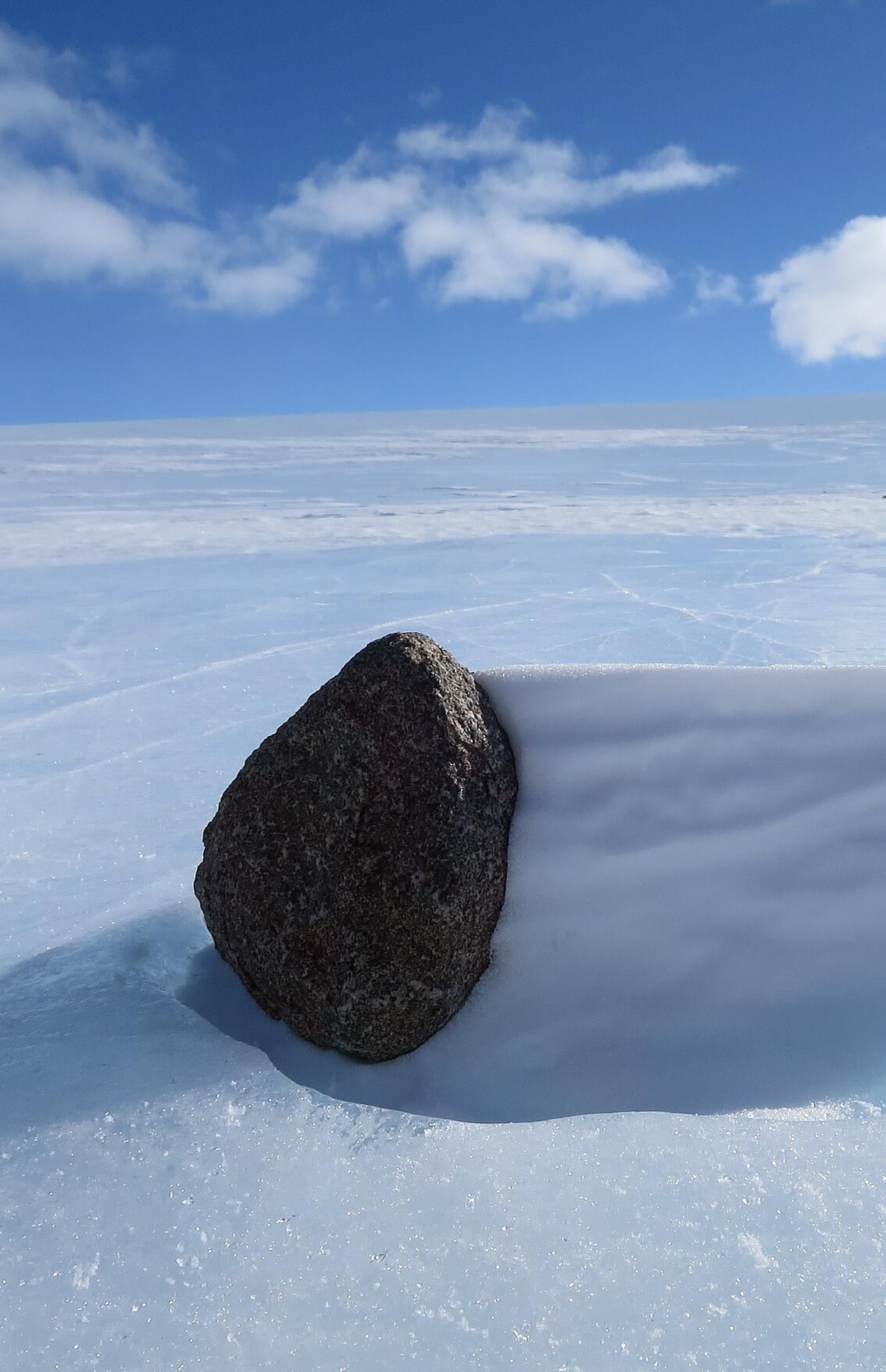 A meteorite on an ice field in the Miller Range, Antarctica