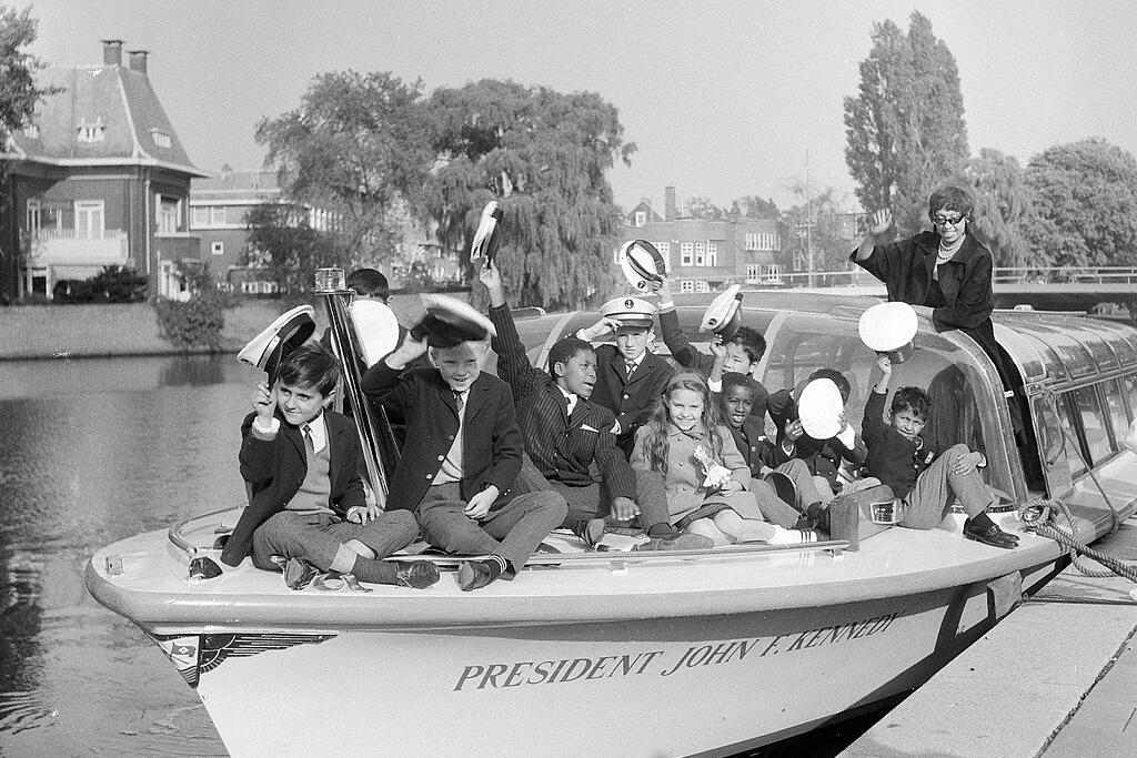 Josephine Baker and 10 of her adopted children on a boat in Amsterdam, 1964