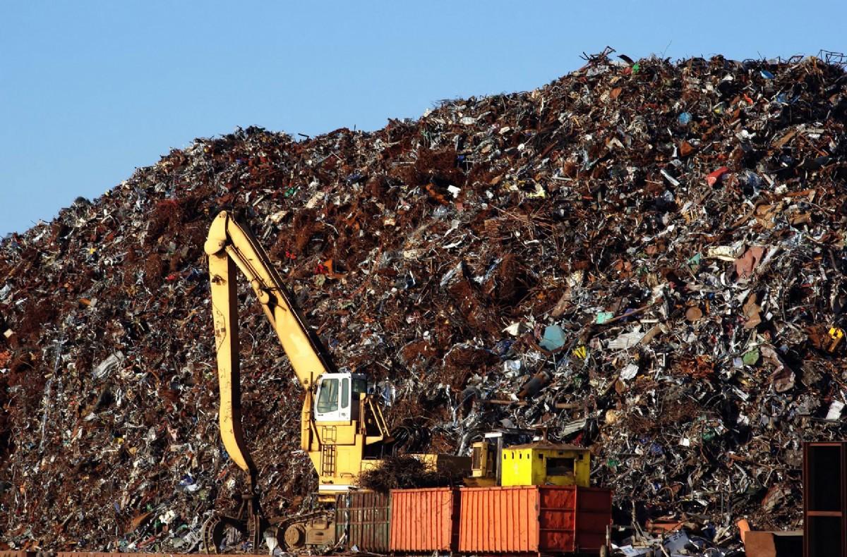 A landfill site, where waste is piled high