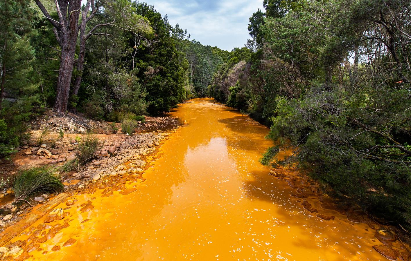 River polluted with acid mine drainage from a copper mine