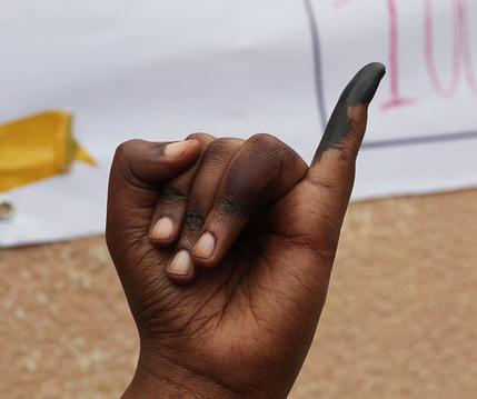 Indelible ink on a voter's finger, to prevent double voting