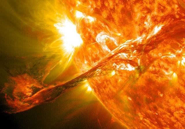 A solar prominence erupts into space
