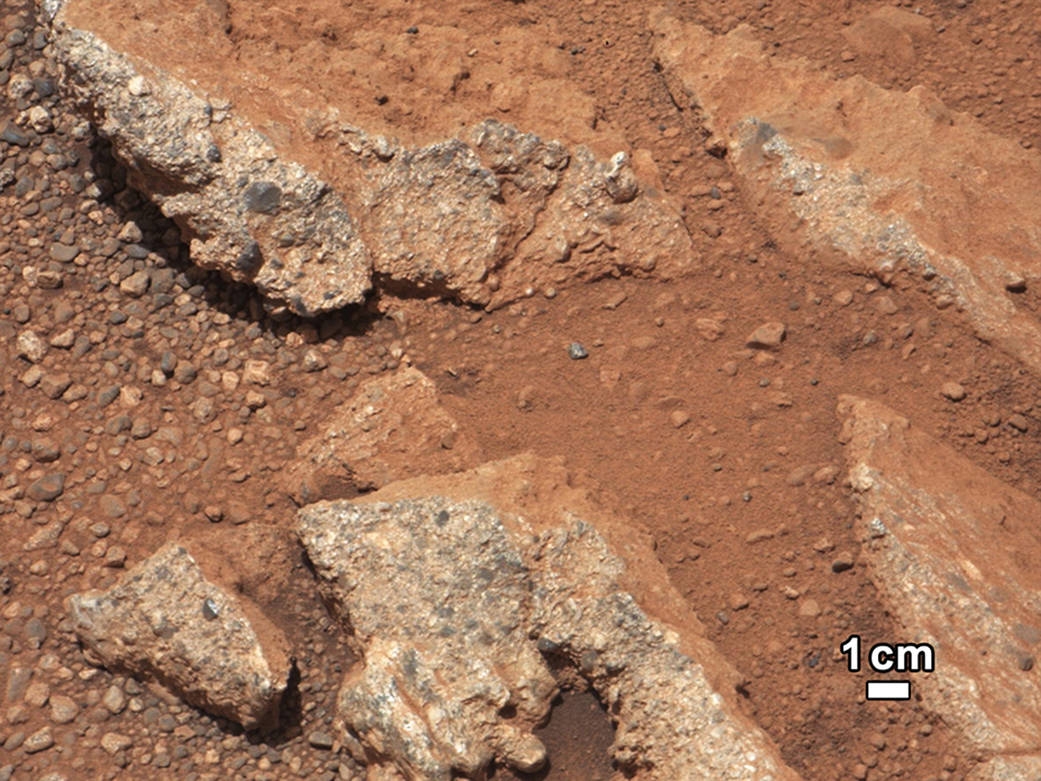 Rounded pebbles on an ancient stream bed on Mars