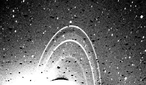 An image of Neptune's faint rings made by Voyager 2