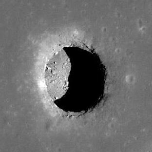 Lunar pit in Mare Tranquillitatis, revealing a cave beneath