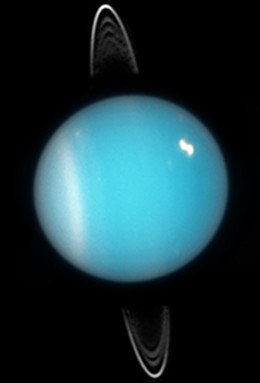A photo of Uranus, showing clouds and rings