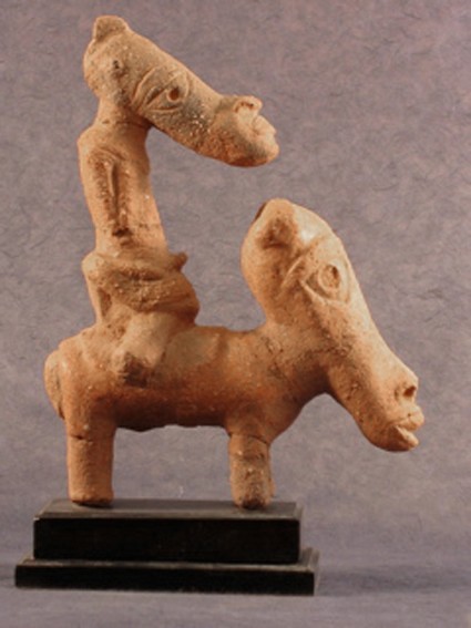 A terracotta rider and horse