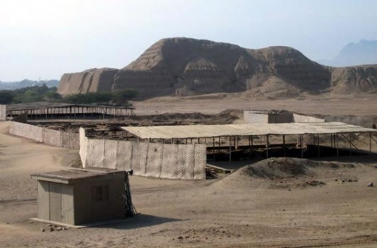 The Huaca del Sol, with city ruins in foreground