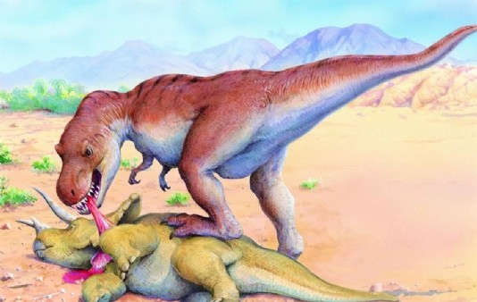 T.rex tears the flesh from its kill.