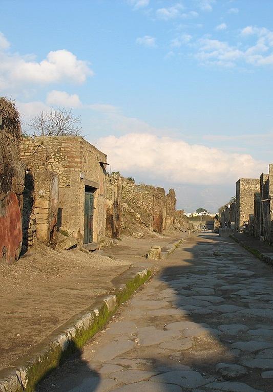 Decaying buildings along the Via dell'Abbondanza