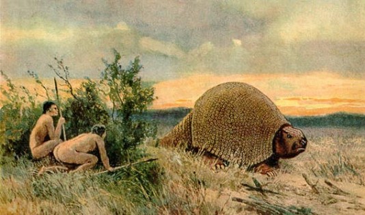 Early settlers in South America hunt a Glyptodon